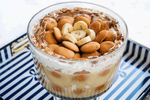 Gif of a bannana dessert with wafer decorations